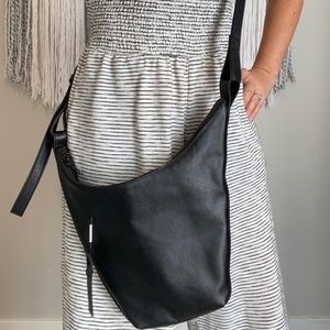 Sarah Pacini black leather cross body bag.